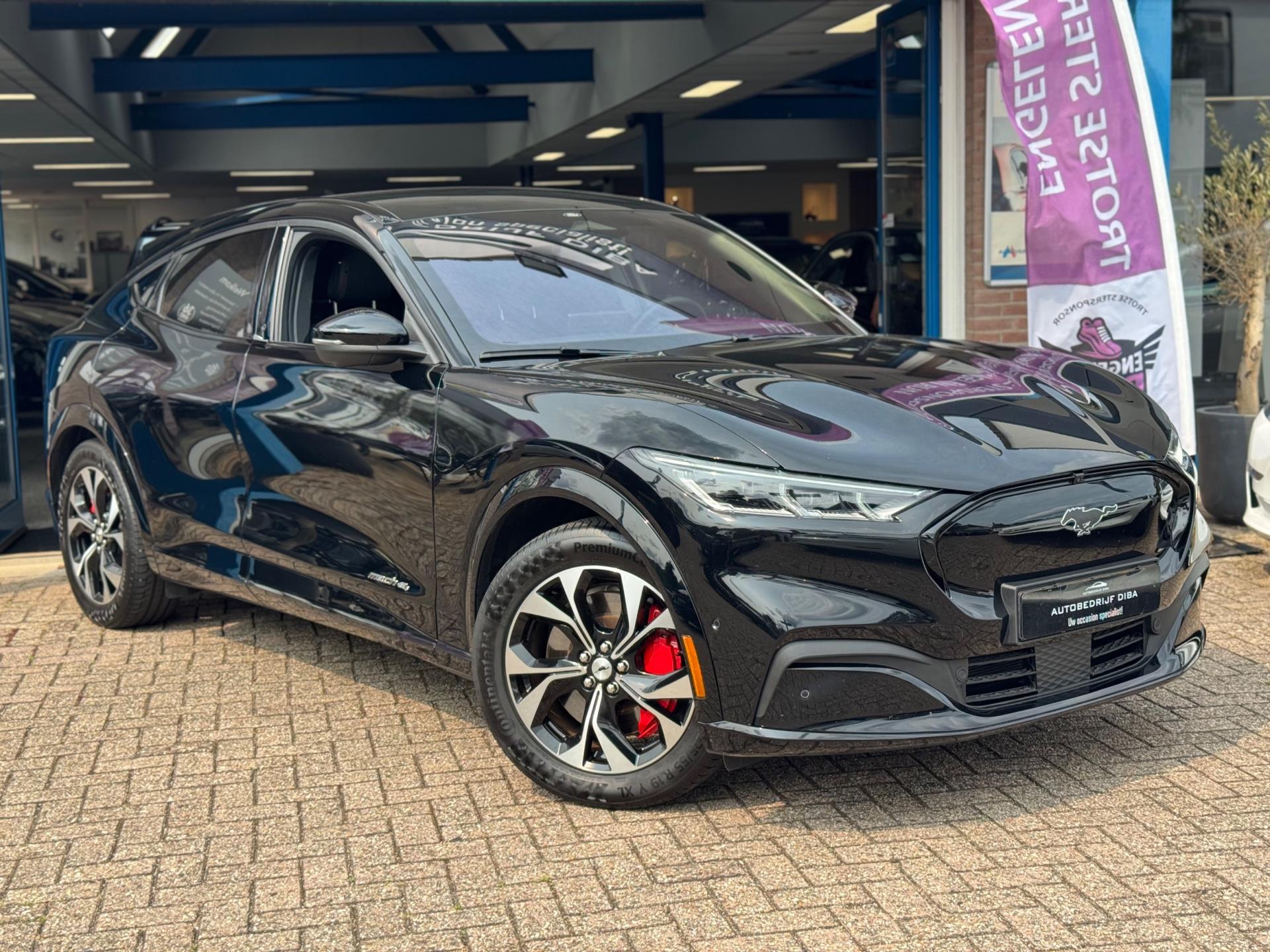 Ford Mustang Mach-E AWD 75 kWh 2021NAVI B&O NAP BTW 1e Eig! 45414396-0.jpg | Autobedrijf Diba