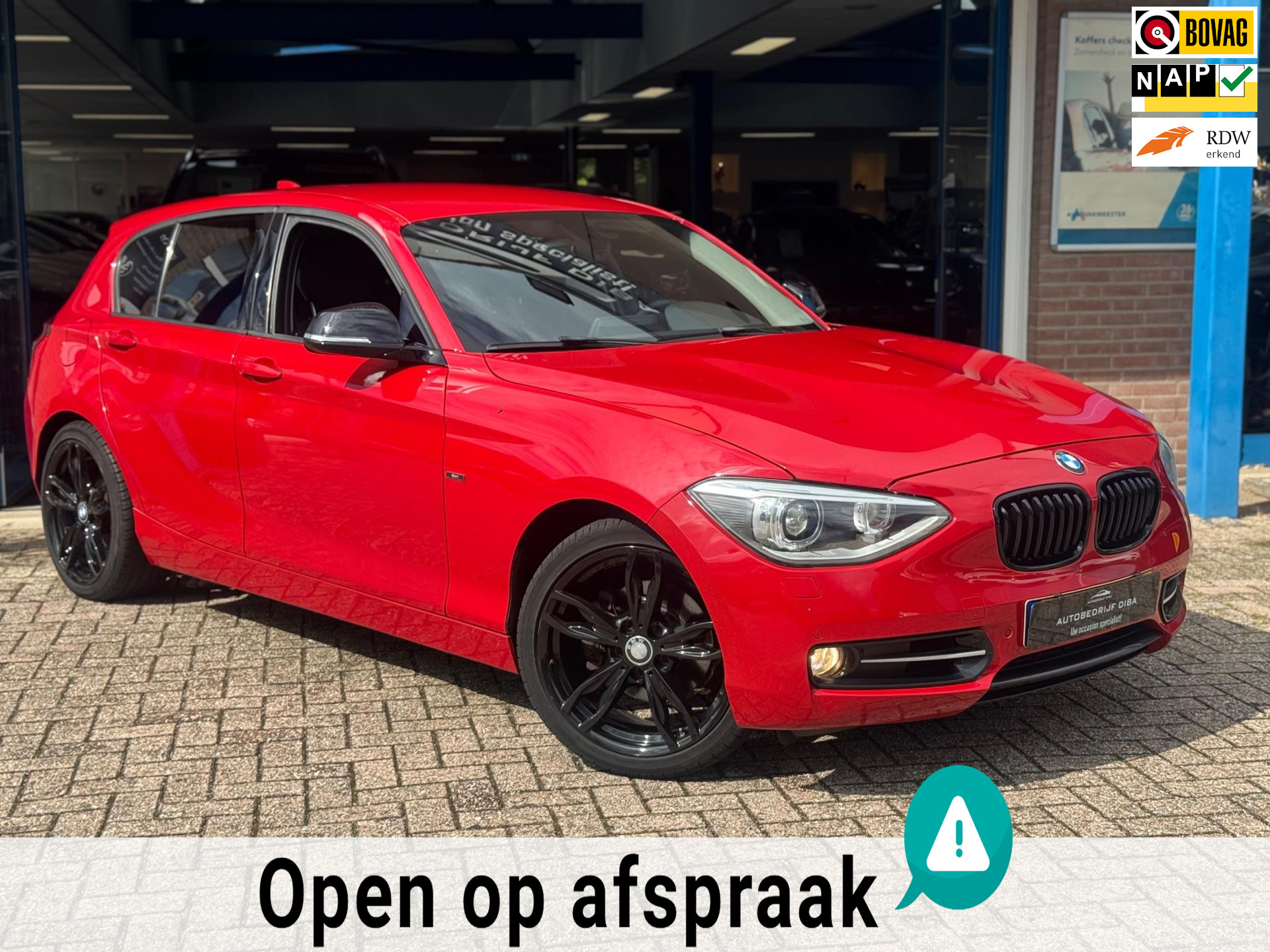 BMW 1 Serie 118i Business+ 2012 ROOD AUT NAVI AIRCO NAP! 46685278-0.jpg | Autobedrijf Diba