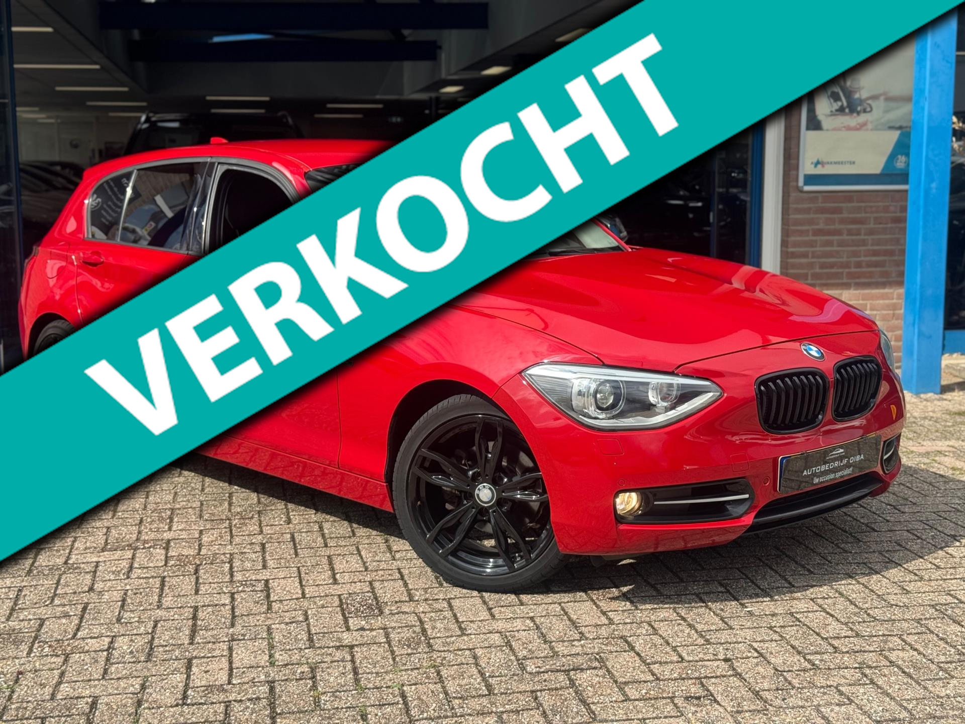BMW 1 Serie 118i Business+ 2012 ROOD AUT NAVI AIRCO NAP! 46685278-0.jpg | Autobedrijf Diba