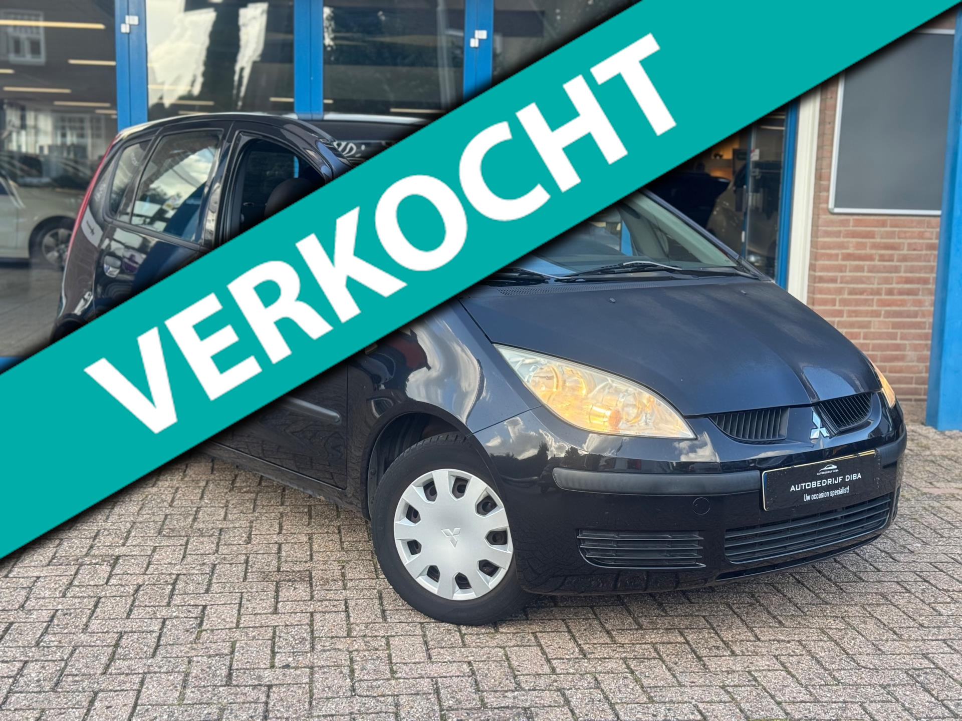 Mitsubishi Colt 1.3 Incharge 2008 5drs Zwart AIRCO APK NAP! 48205378-0.jpg | Autobedrijf Diba